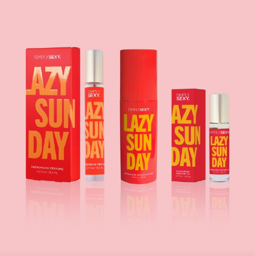 Two bottles and two boxes of 'Lazy Sunday' perfume by Sexy on a pink background