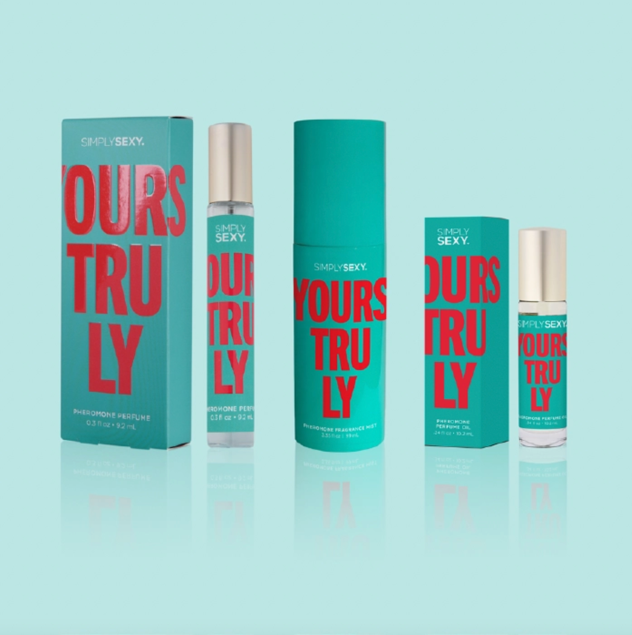 Perfume bottles and packaging with 'Ours Truly' text on a light blue background